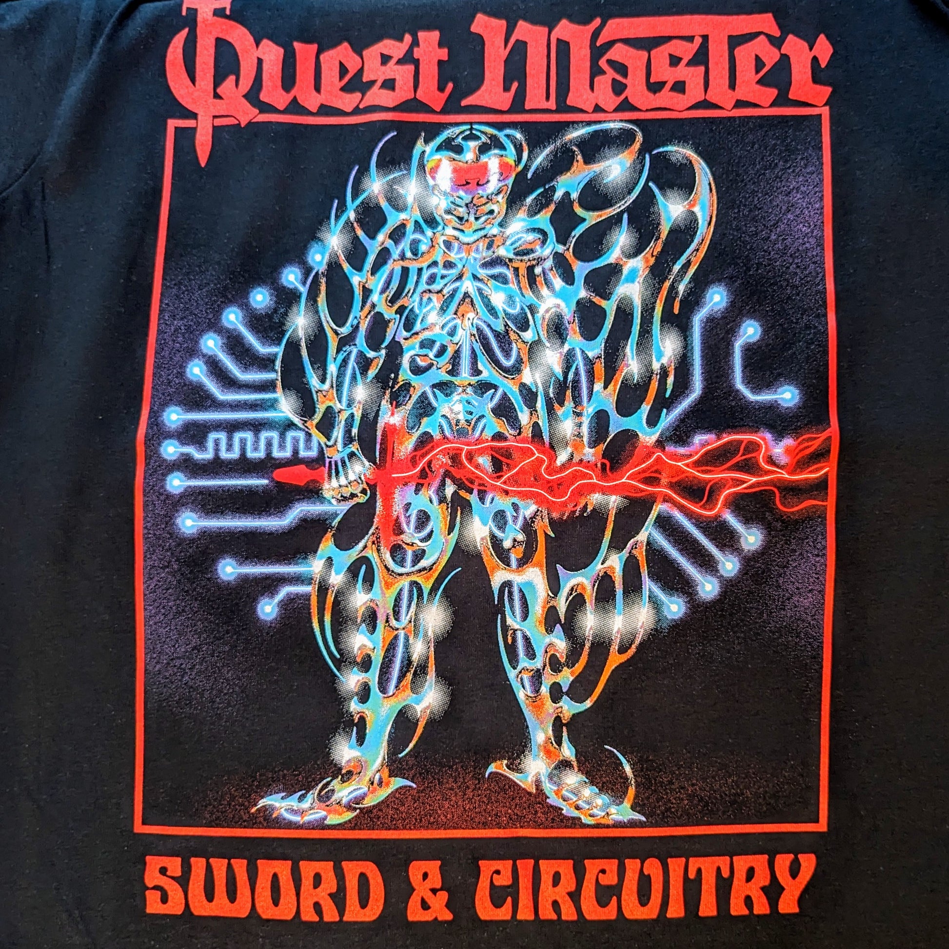 QUEST MASTER "Sword and Circuitry" T-Shirt, black shirt with multicolor print, front detail