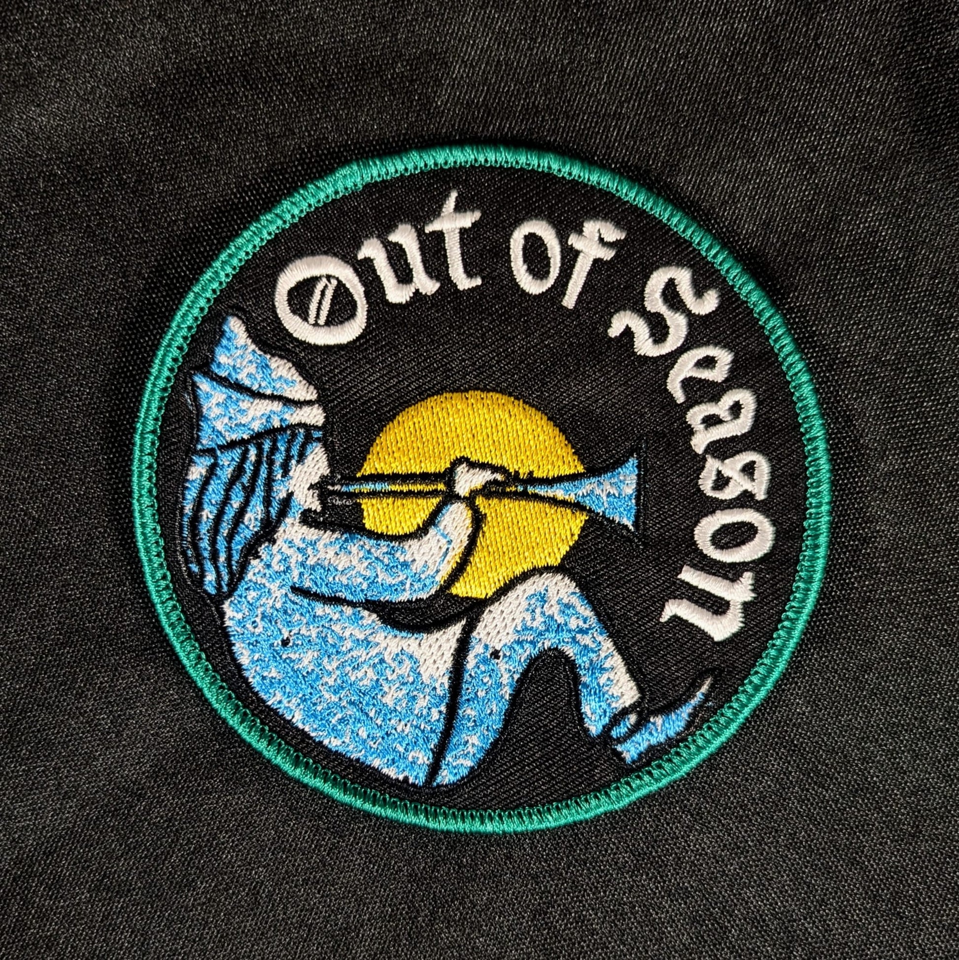 OUT OF SEASON "Bard Logo" Embroidered Patch, round patch with white, yellow, blue and green detail