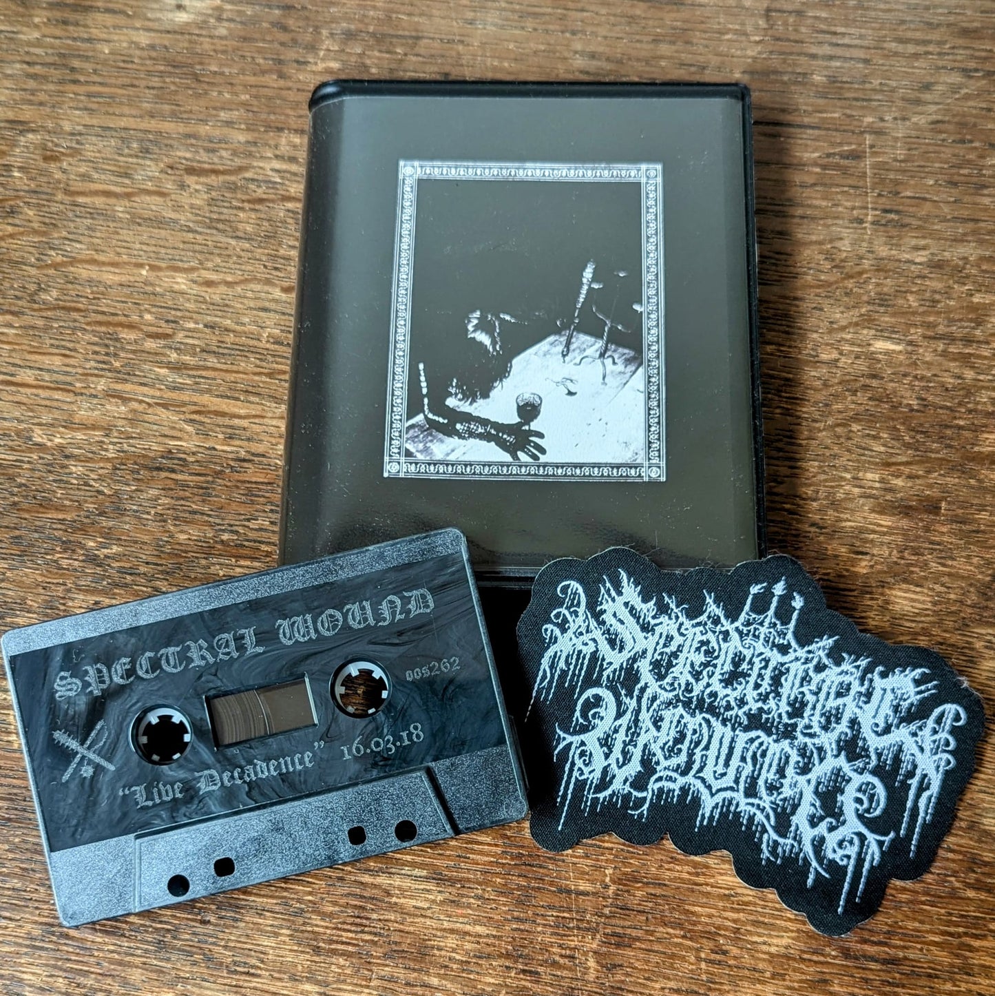 SPECTRAL WOUND "Live Decadence 16.03.18" Cassette Tape (in album case w/ logo patch)