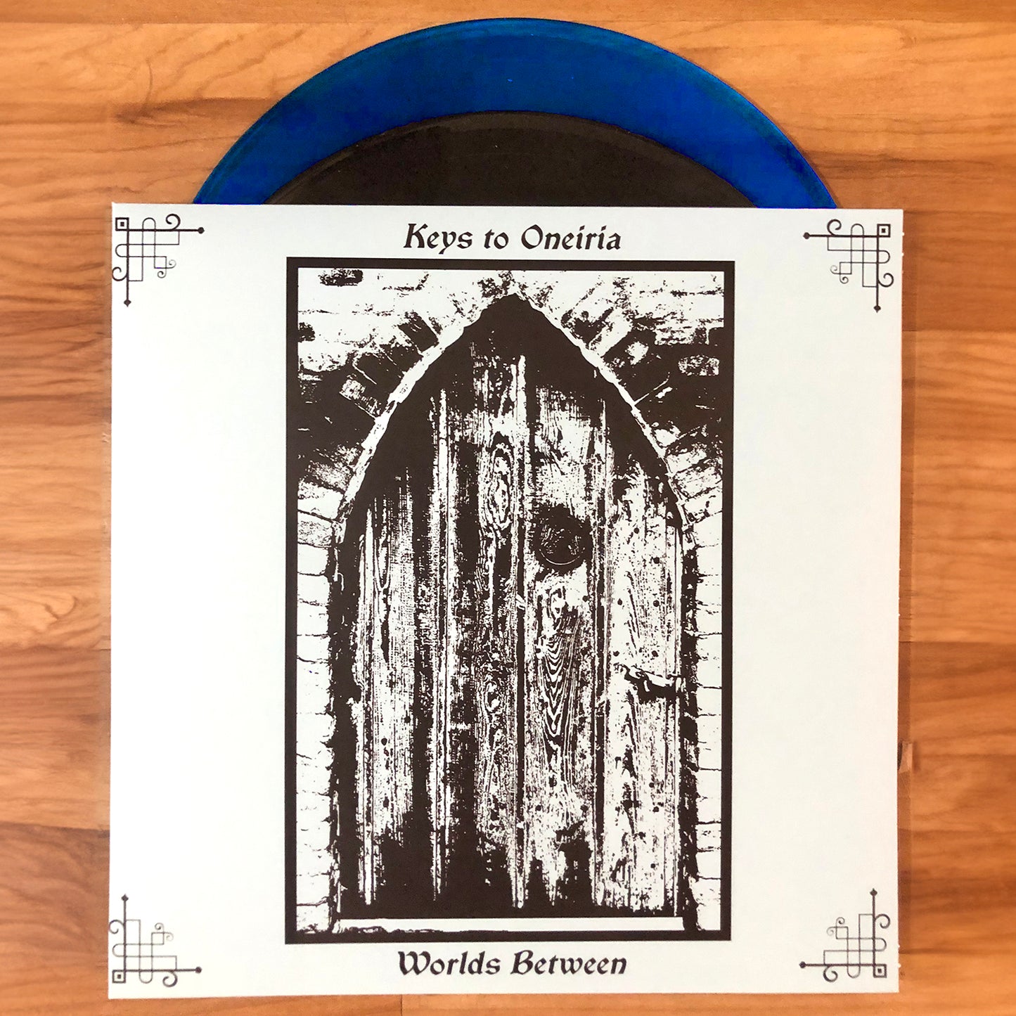 KEYS TO ONEIRIA Worlds Between vinyl LP, blue vinyl or black vinyl color, with printed record jacket